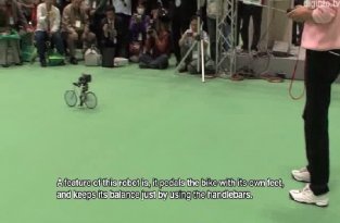 Японский робот велосипедист