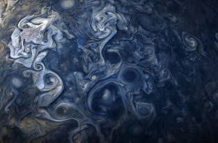 NASA показало удивительное явление на Юпитере (7 фото)
