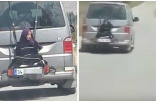 Заботливый папа привязал дочь к багажнику по её просьбе и поплатился за это (2 фото + 1 видео)