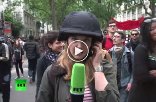 Проукраинские активисты не дали сделать репортаж журналистке RT во время митинга в Париже