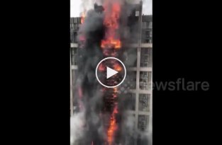 Как горит офисное здание в Чжэнчжоу