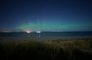 Северное сияние и лунная радуга (8 фото)