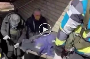 На видео - вынос тел украинцев, замученных российскими ублюдками из пыточного подвала